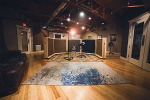 What role do producers and engineers play in modern recording studios?